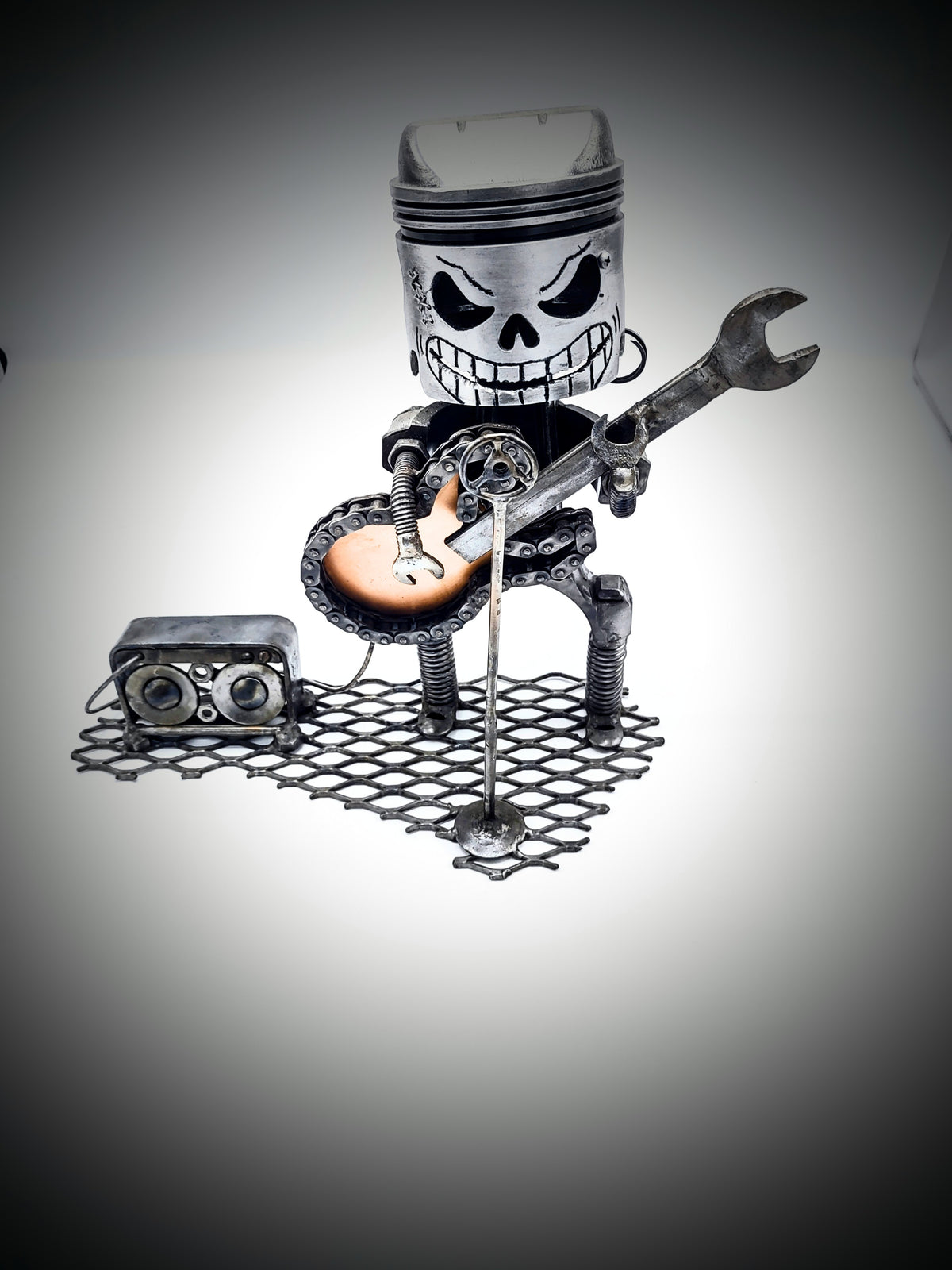 Piston Head Guitar Player